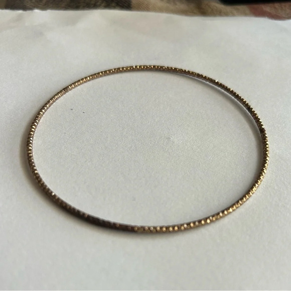 3/$20 2 Piece Set Gold Tone Imprinted Shimmer Thin Large Bangle Bracelets - Picture 2 of 4